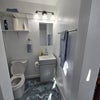 Photo 3: New Bathroom: wall-mounted shelves/med cabinet