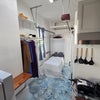 Photo 7: Murphy foldaway Bed/Wall mounted shelves & closet area/mini-kitchenette
