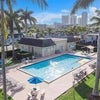 Photo 3: Pool and Clubhouse