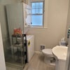 Photo 4: Available room's bathroom w/ in-unit laundry