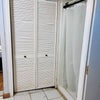 Photo 8: Private bathroom with a shower