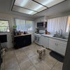 Photo 6: Kitchen and my pup 