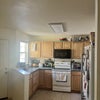 Photo 7: Kitchen (larger than picture is capturing)