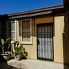 Photo 2: Your private entry door with security screen so you can let in the cool evening breeze.