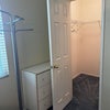 Photo 5: Bedroom#1 Walk-in-closet + chest of drawers.