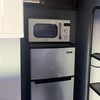 Photo 8: Regrigerator and microwave