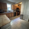 Photo 2: Kitchen w/ full fridge