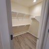 Photo 3: Large walk in closet