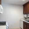 Photo 8: Kitchen with stove and sink