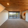 Photo 3: Main floor shared living room and balcony