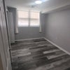 Photo 4: Bright and sunny Large room with double closets!