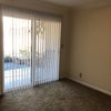 Photo 2: Room has access to a private patio with greenbelt view