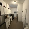 Photo 5: view of the kitchen and the entrance of the apt