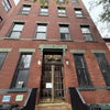 Photo 6: Entrance of the building