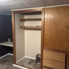 Photo 2: Built-in desk in the corner. No doors on the closet