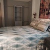 Photo 2: Queen size bed and great closet spaces. 