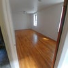 Photo 7: Available room pictured empty