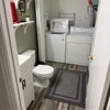Photo 7: Laundry and first floor guest bathroom
