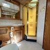 Photo 2: Large barhroom doors open to large full length mirrors to get ready as well 