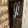 Photo 7: Bedroom closet, 2 racks for hangers, 2shelves above