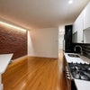 Photo 3: Front Door View Kitchen/Salon