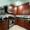 Photo 7: Another angle of the shared kitchen space.