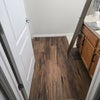 Photo 7: Full bathroom with new hardwood floors and fixtures