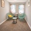 Photo 5: Comfortable shared sitting area for relaxing or reading.