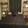 Photo 8: This is what it looked like when I had it furnished. That is a queen size bed and two bookcases.