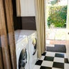 Photo 8: Shared Washer and Dryer