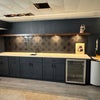 Photo 3: Basement rec room with 85 inch tv