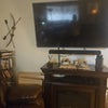 Photo 6: Wall mounted LG screen TV on.electric fireplace