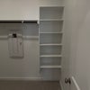 Photo 4: Built in shelves closet
