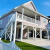Photo 1: Front of the Home w/ 5 Parking spaces