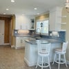 Photo 3: Kitchen and Bar Area