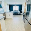 Photo 5: Full kitchen to Dining