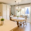 Photo 4: Kitchen and dining area