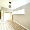 Photo 9: great storage, full size closet and a built in deep shelves storage space next to the closet. 