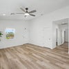 Photo 5: Front door and living room
