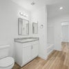 Photo 7: This would be your restroom. It is also the guest restroom. 