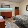 Photo 2: Large bedroom with TV
