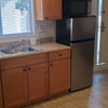 Photo 9: Kitchenette, refrigerator & microwave