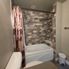 Photo 6: Shared full bath