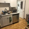 Photo 5: Bathroom is off the kitchen
