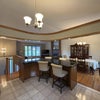 Photo 5: Shared furnished upstairs kitchen, dining, and living spaces