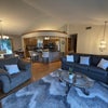 Photo 4: Shared furnished upstairs kitchen, dining, and living spaces