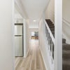 Photo 7: First Floor - Front Entrance