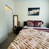 Photo 2: Furnished bedroom with walk-in closet 