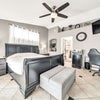 Photo 3: Master bedroom suite - king bed, corner desk 60 inch tv, mini fridge, microwave,  2 night stands, ar