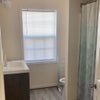 Photo 7: shared bathroom 